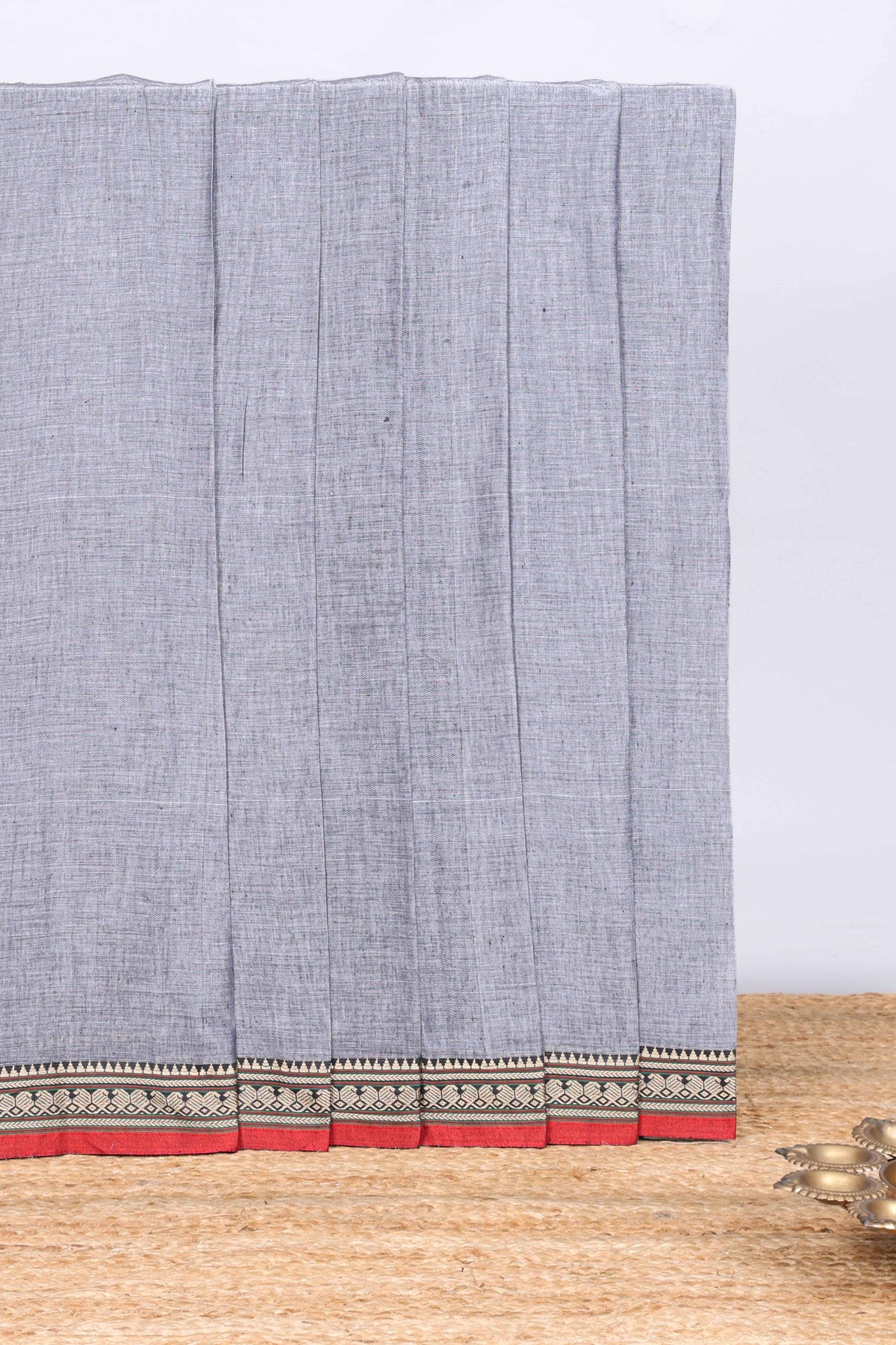 Light grey plain narayanapet cotton saree with contrast temple border and stripe pallu