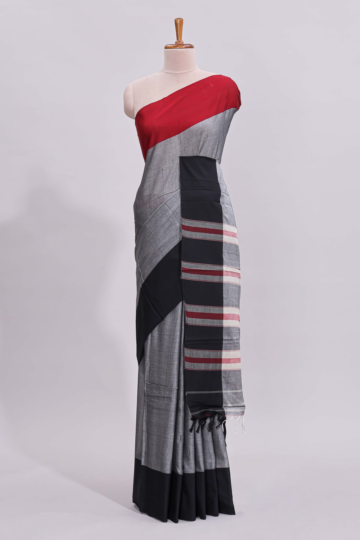 Grey plain narayanapet cotton saree with contrast border and striped blouse