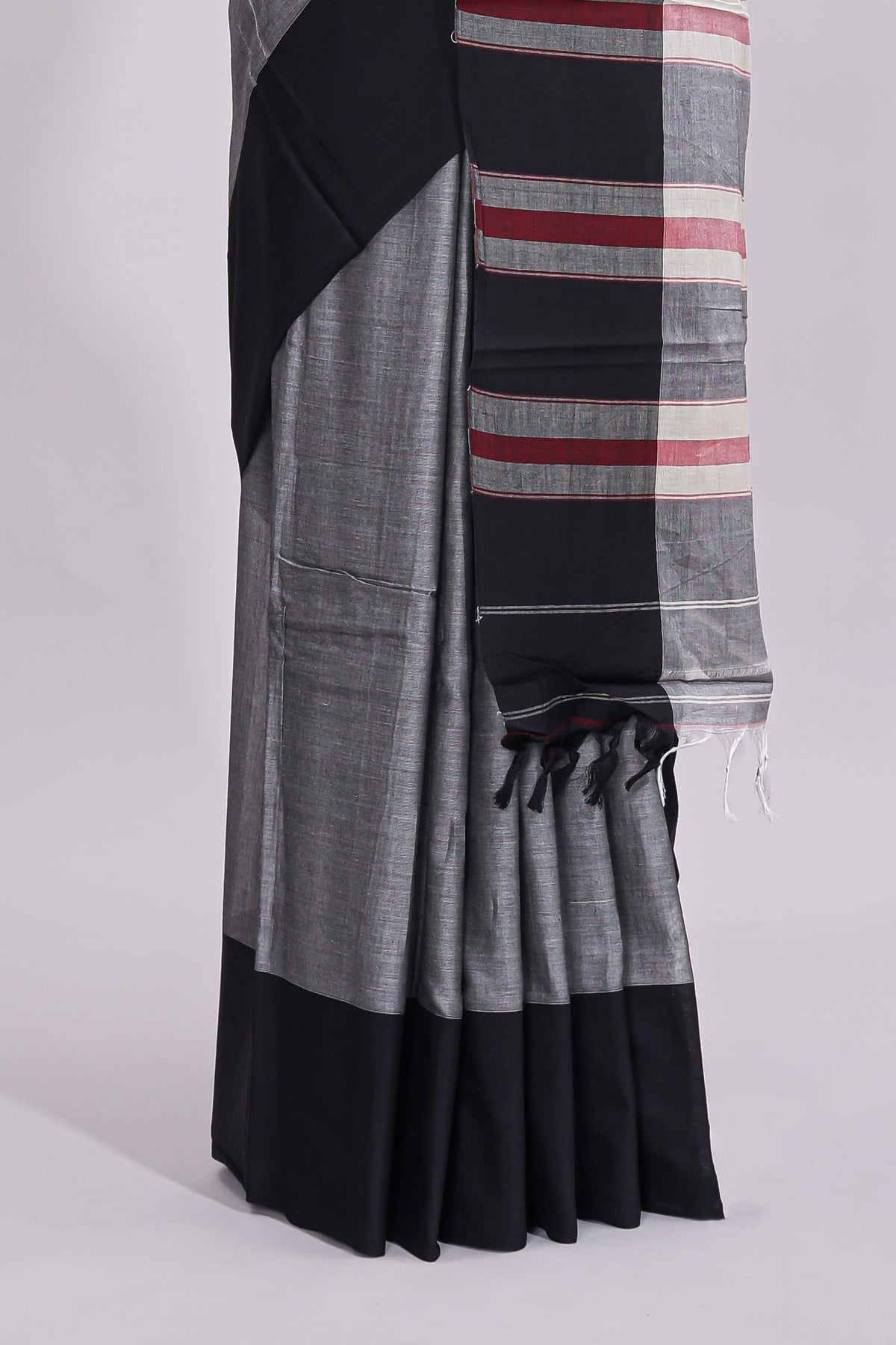 Grey plain narayanapet cotton saree with contrast border and striped blouse