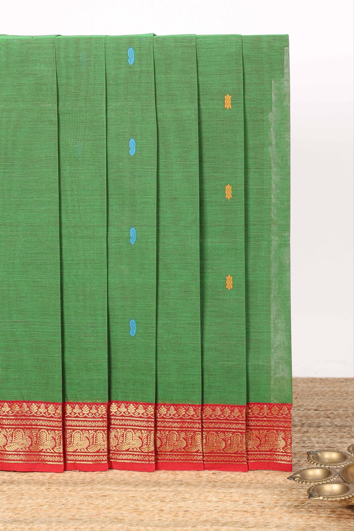 Green motifs design narayanapet cotton saree with contrast zari border and matching blouse