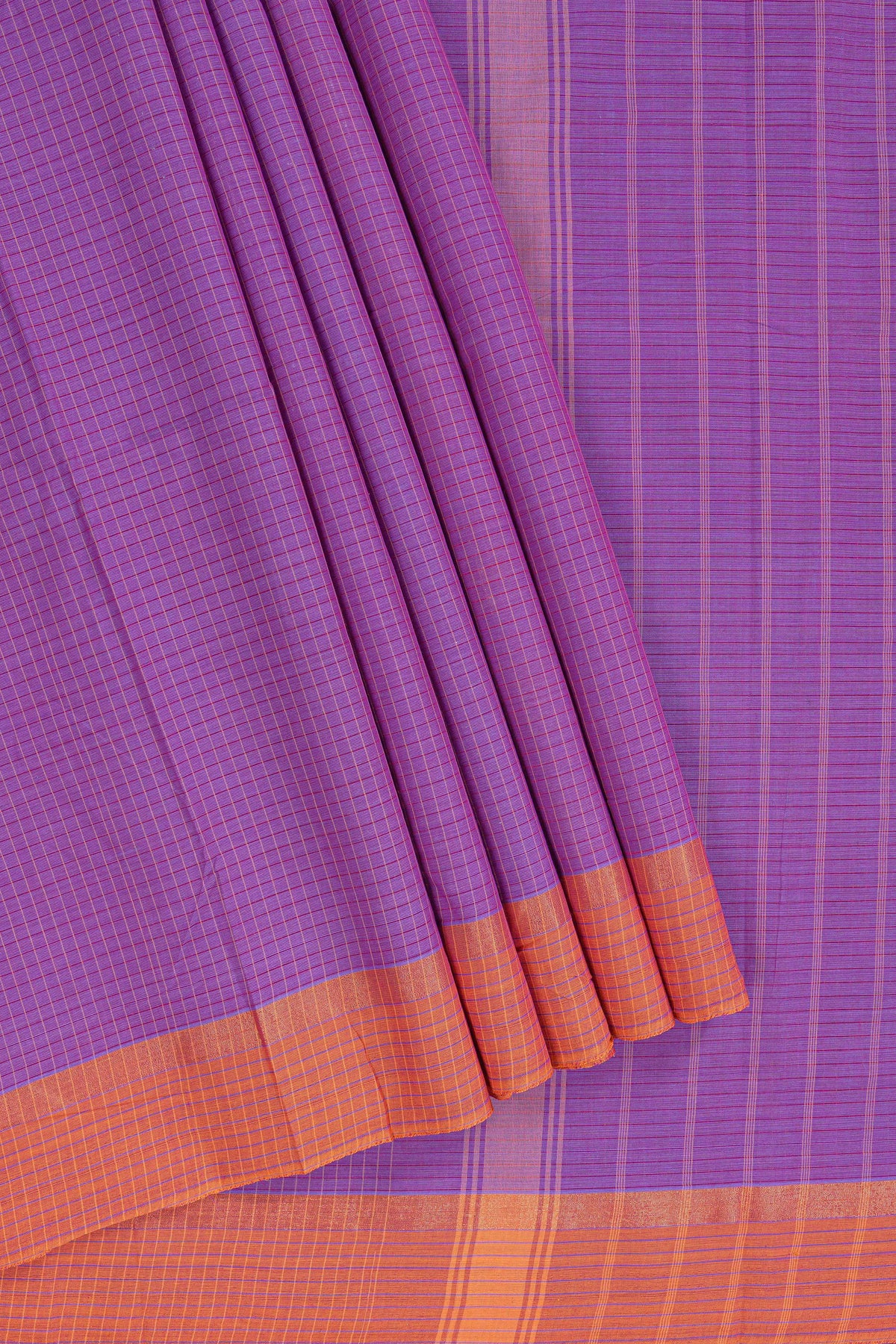 Traditional purple colour Madisar Style Nine Yard Saree with Plain body and traditional thread motifs border and self pallu along with blouse piece