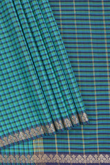 Traditional peacock blue colour Madisar Style Nine Yard Saree with checks and contrast border and self pallu along with blouse piece