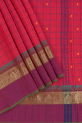 Traditional bright red colour Madisar Style Nine Yard Saree with checks and contrast border and self pallu along with blouse piece