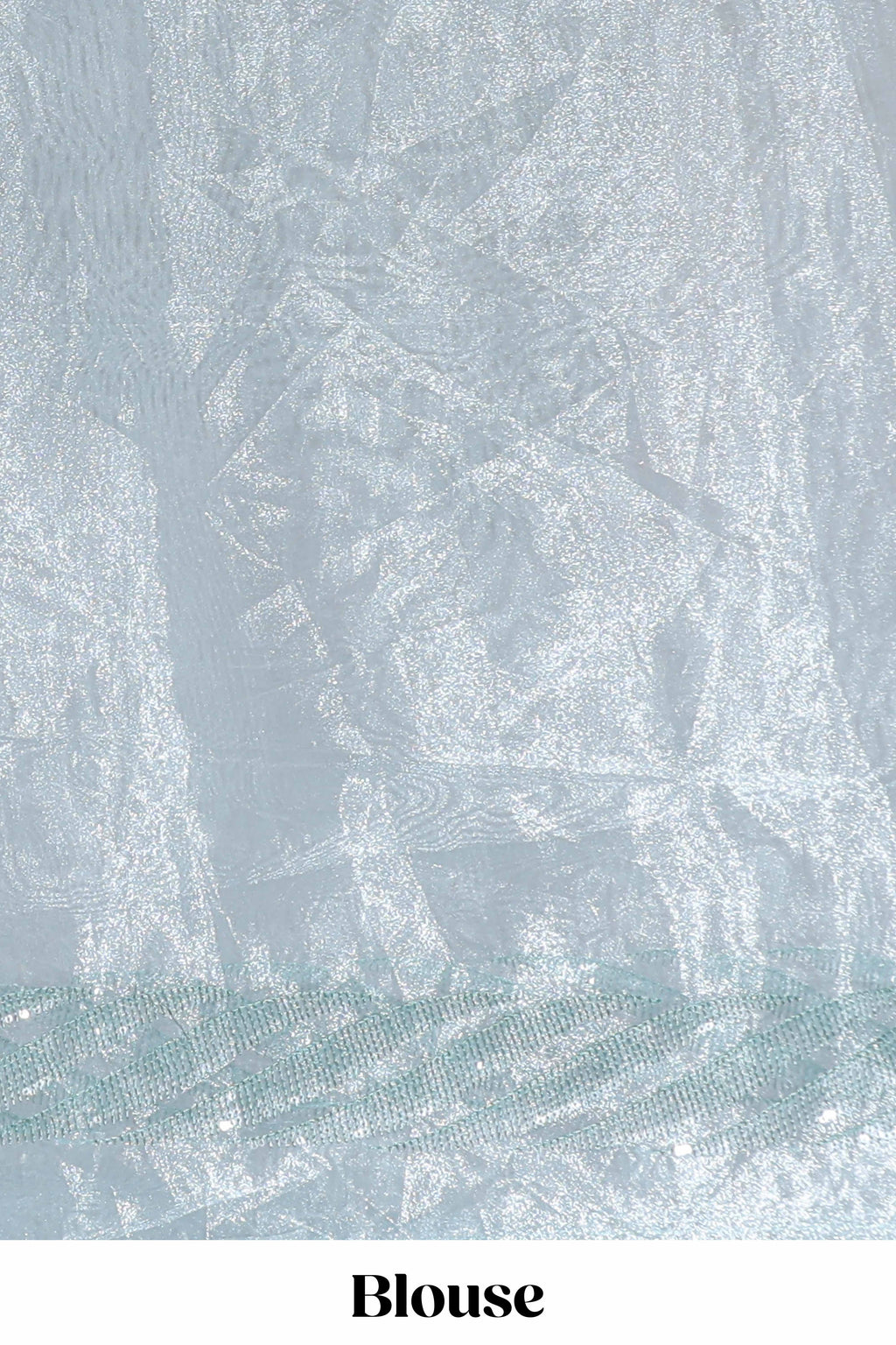 Pastel blue organza saree featuring delicate floral embroidery, intricate lace detailing on the border and pallu with a scalloped finishing along with matching blouse