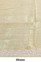 Pastel yellow organza saree featuring delicate floral embroidery intricate lace detailing on the border and pallu with a scalloped finishing along with matching blouse