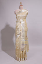 Cream organza saree featuring delicate floral embroidery intricate with silver  border along with blouse