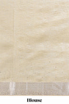 Cream organza saree featuring delicate floral embroidery intricate with silver  border along with blouse