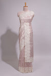 Soft blush pink organza saree with delicate floral embroidery intricate lace border and scalloped pallu detailing