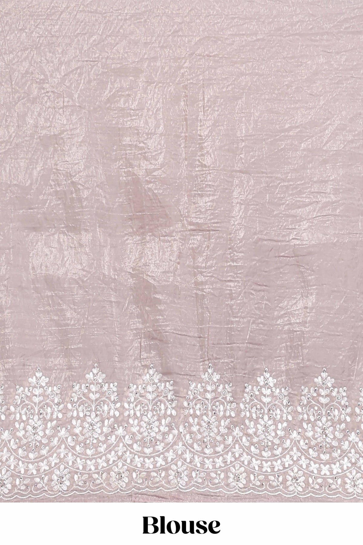 Soft blush pink organza saree with delicate floral embroidery intricate lace border and scalloped pallu detailing