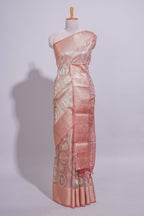 Peach Shade Geometric Design organza saree with Zari border and matching floral motifs blouse