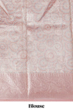 Peach Shade Geometric Design organza saree with Zari border and matching floral motifs blouse