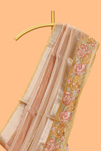 Peach gold striped art tissue saree with floral embroidered border and striped pallu