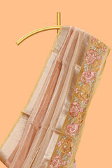Peach gold striped art tissue saree with floral embroidered border and striped pallu