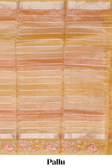 Peach gold striped art tissue saree with floral embroidered border and striped pallu