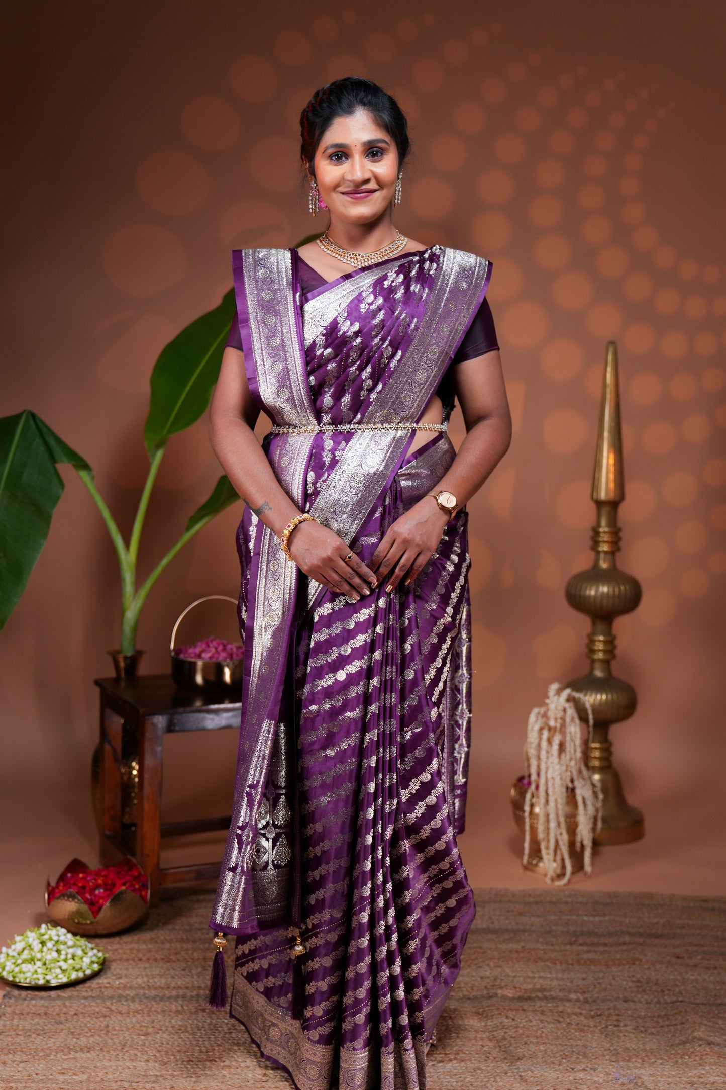 Purple floral vine stone work banarasi silk saree with self zari border and matching blouse