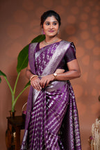 Purple floral vine stone work banarasi silk saree with self zari border and matching blouse