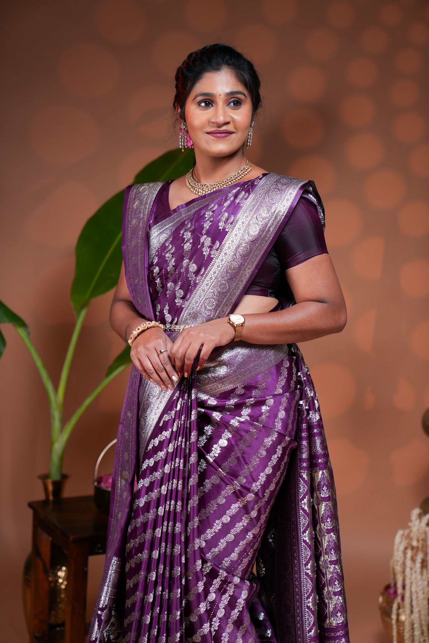 Purple floral vine stone work banarasi silk saree with self zari border and matching blouse