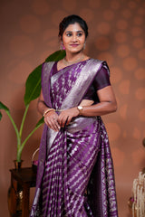 Purple floral vine stone work banarasi silk saree with self zari border and matching blouse