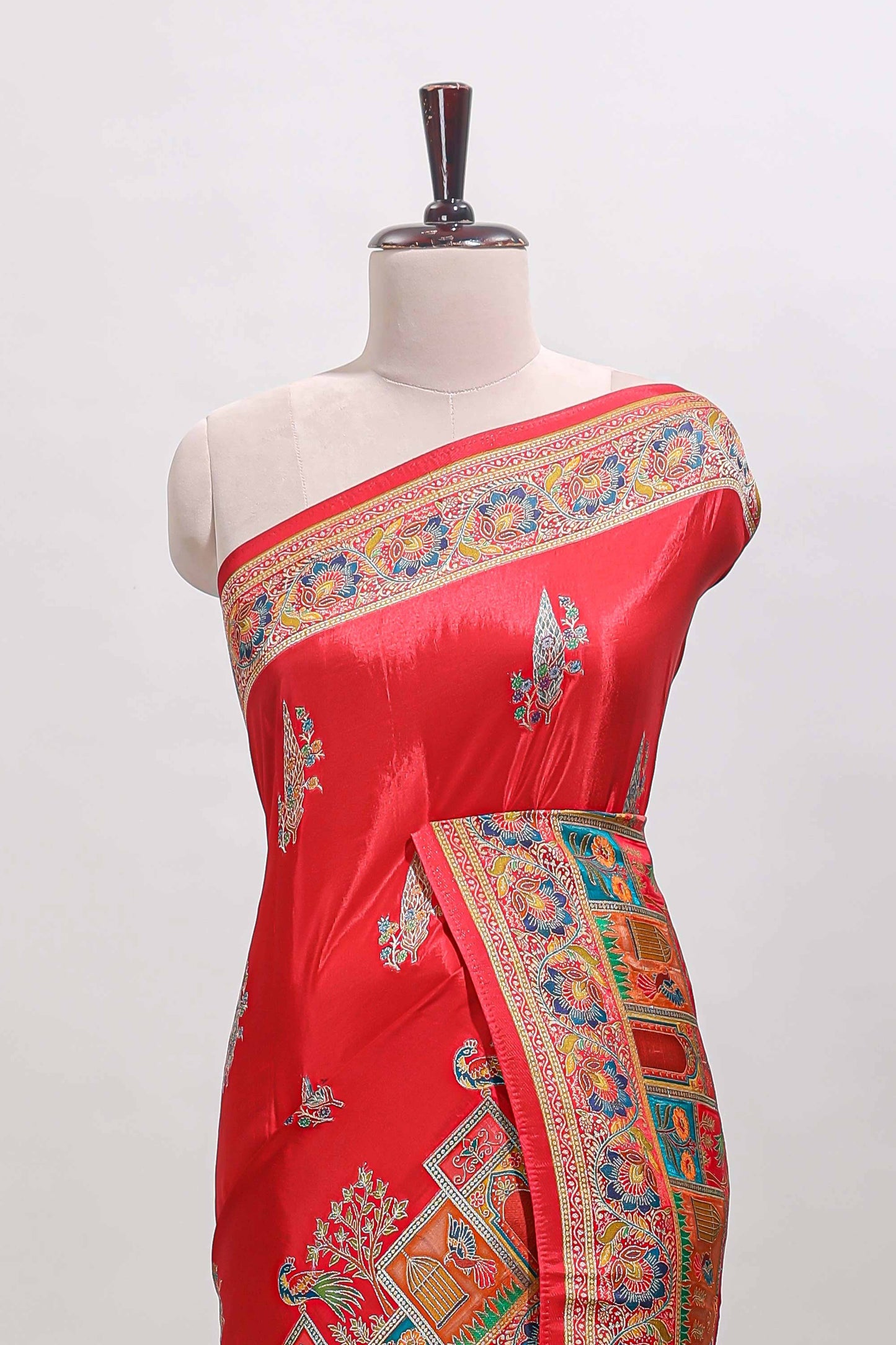 Red floral design motifs banarasi silk saree with contrast floral print border and matching blouse