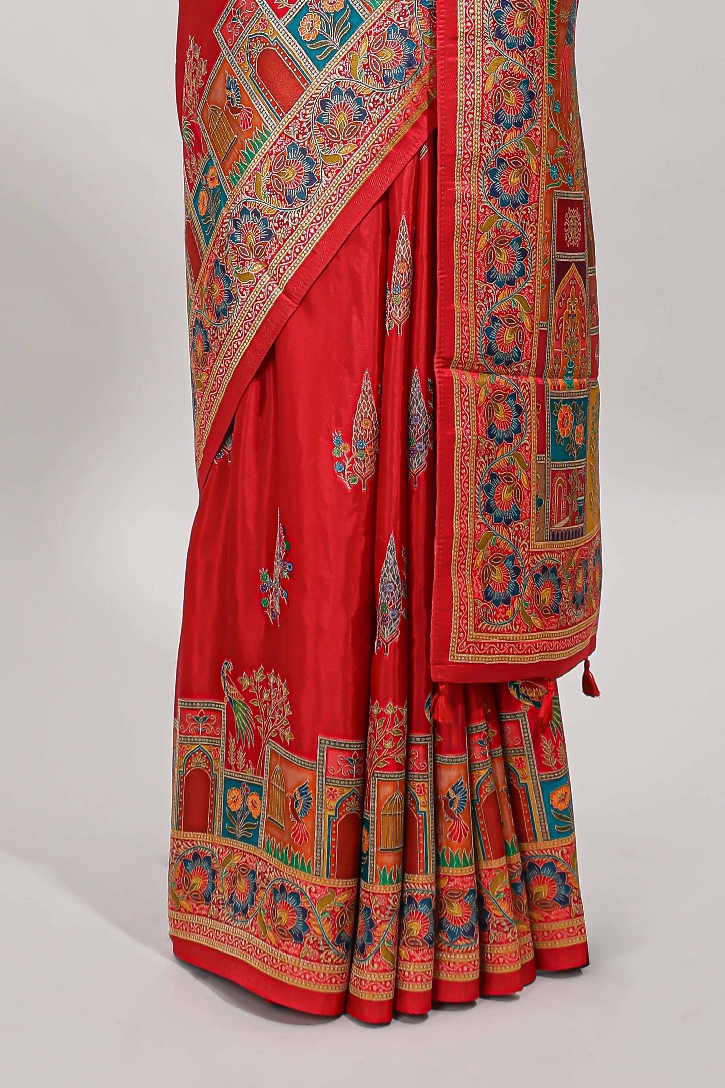 Red floral design motifs banarasi silk saree with contrast floral print border and matching blouse