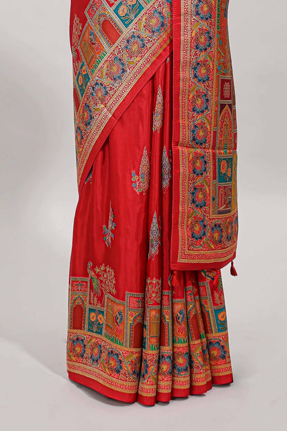 Red floral design motifs banarasi silk saree with contrast floral print border and matching blouse