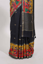 Black zari butta banarasi silk saree with contrast kalamkari style border and matching blouse
