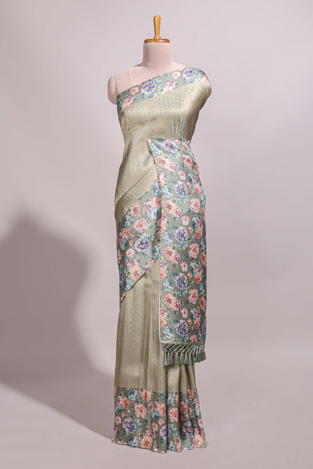 Green floral zari motifs banarasi silk saree with contrast border and printed blouse