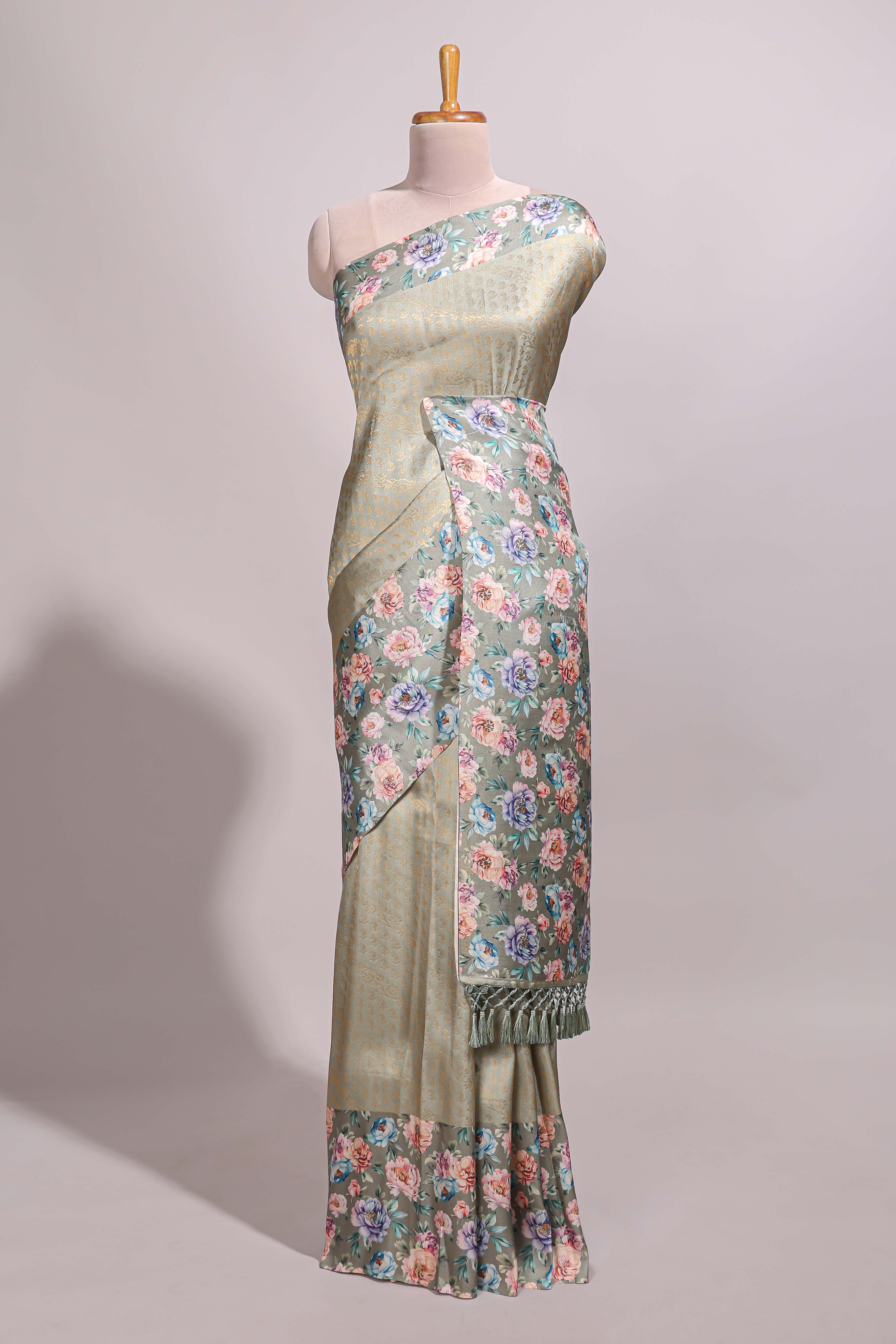 Green floral zari motifs banarasi silk saree with contrast border and printed blouse