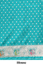 Green floral zari design banarasi silk saree with self border and matching printed blouse
