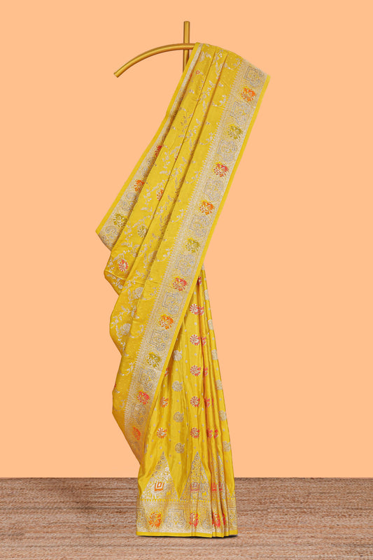 Yellow floral zari design banarasi silk saree with self border and matching printed blouse