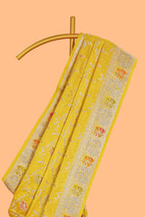Yellow floral zari design banarasi silk saree with self border and matching printed blouse