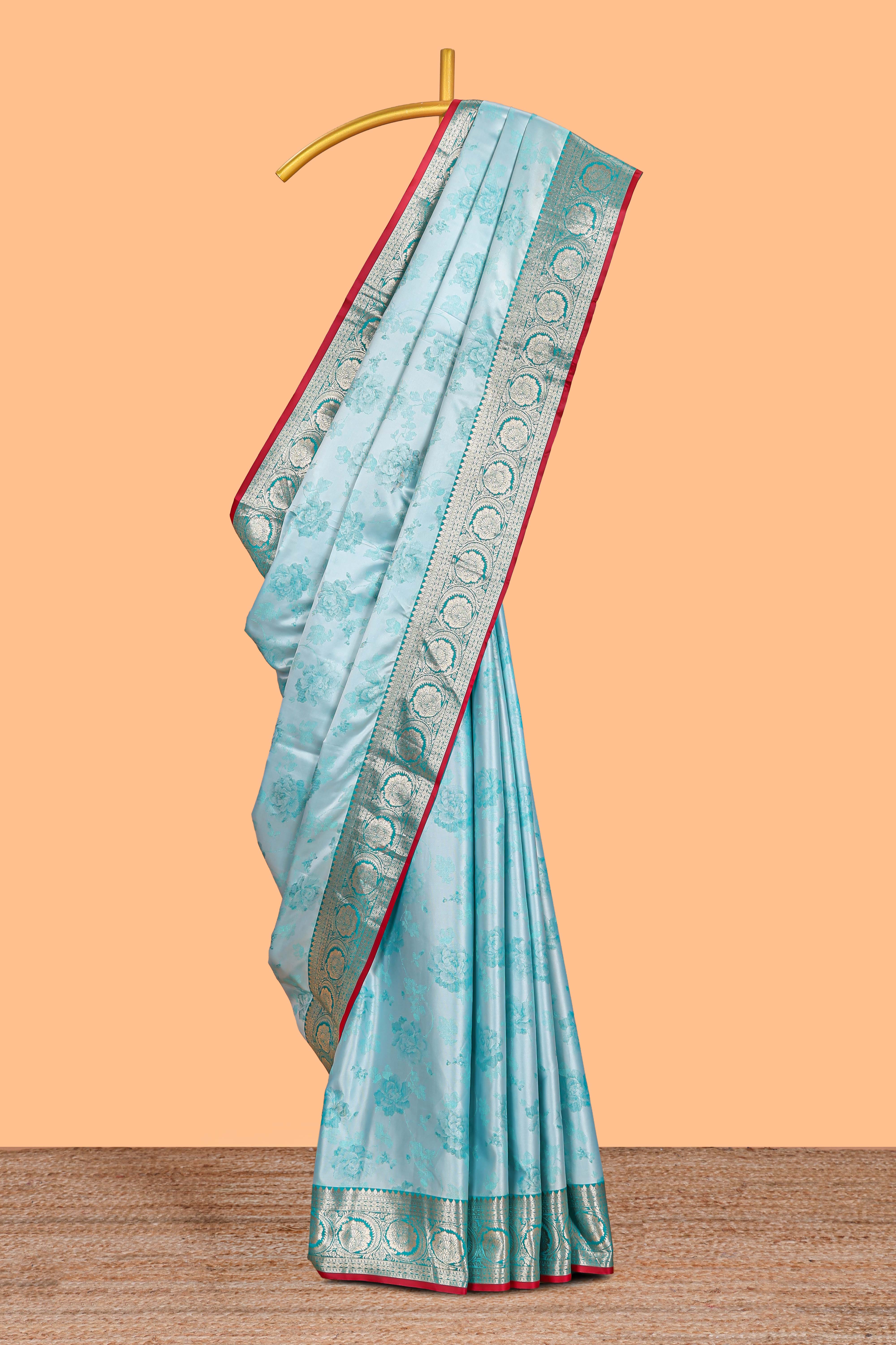 Blue floral zari design banarasi silk saree with self border and matching printed blouse