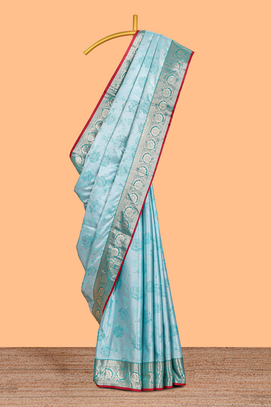 Blue floral zari design banarasi silk saree with self border and matching printed blouse