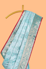 Blue floral zari design banarasi silk saree with self border and matching printed blouse