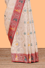 Cream floral design banarasi silk saree with contrast border and floral printed blouse