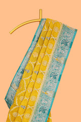 Yellow floral design banarasi silk saree with contrast border and floral printed blouse