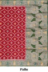 Red floral design banarasi silk saree with contrast border and floral printed blouse