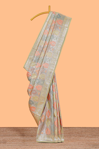 Pastel mint green floral design motifs banarasi silk saree with self border and matching floral printed blouse