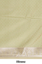 Pastel mint green floral design motifs banarasi silk saree with self border and matching floral printed blouse