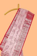 Baby pink floral design motifs banarasi silk saree with contrast border and matching floral print blouse