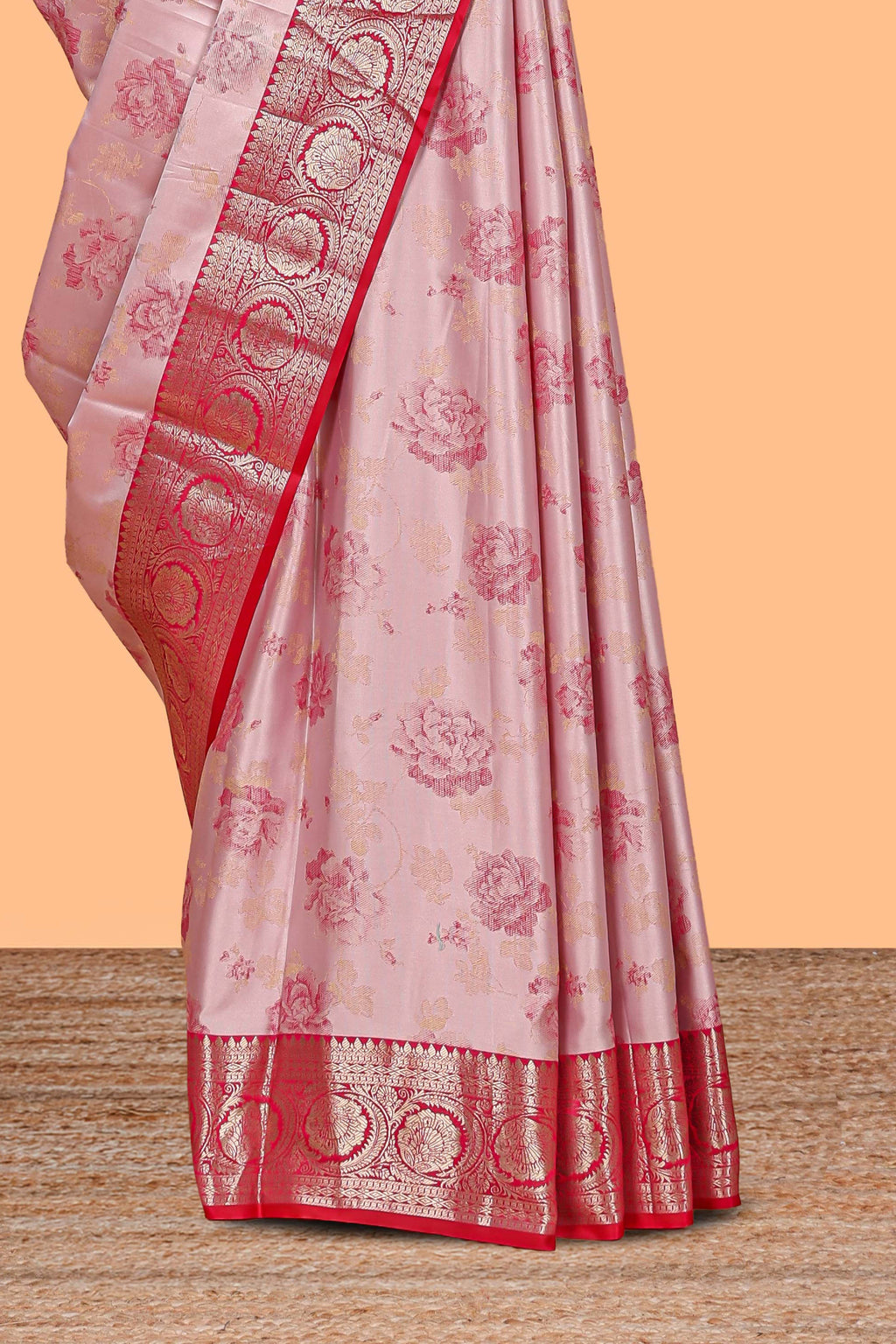 Baby pink floral design motifs banarasi silk saree with contrast border and matching floral print blouse