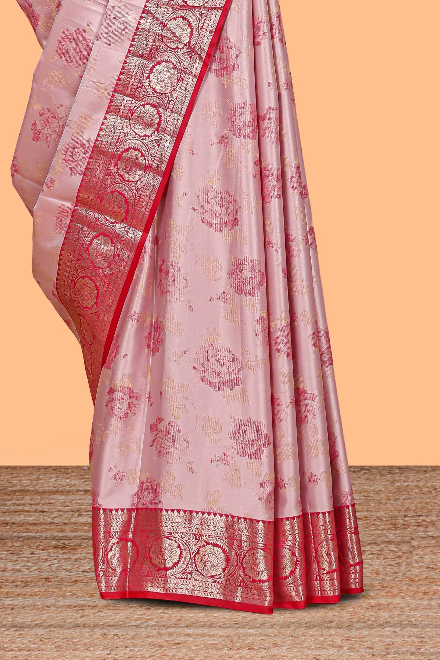 Baby pink floral design motifs banarasi silk saree with contrast border and matching floral print blouse