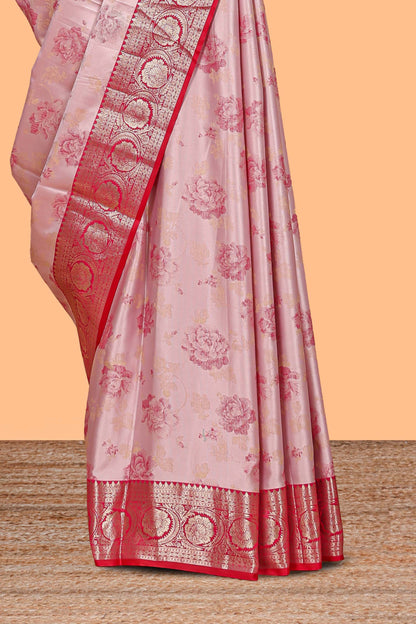 Baby pink floral design motifs banarasi silk saree with contrast border and matching floral print blouse