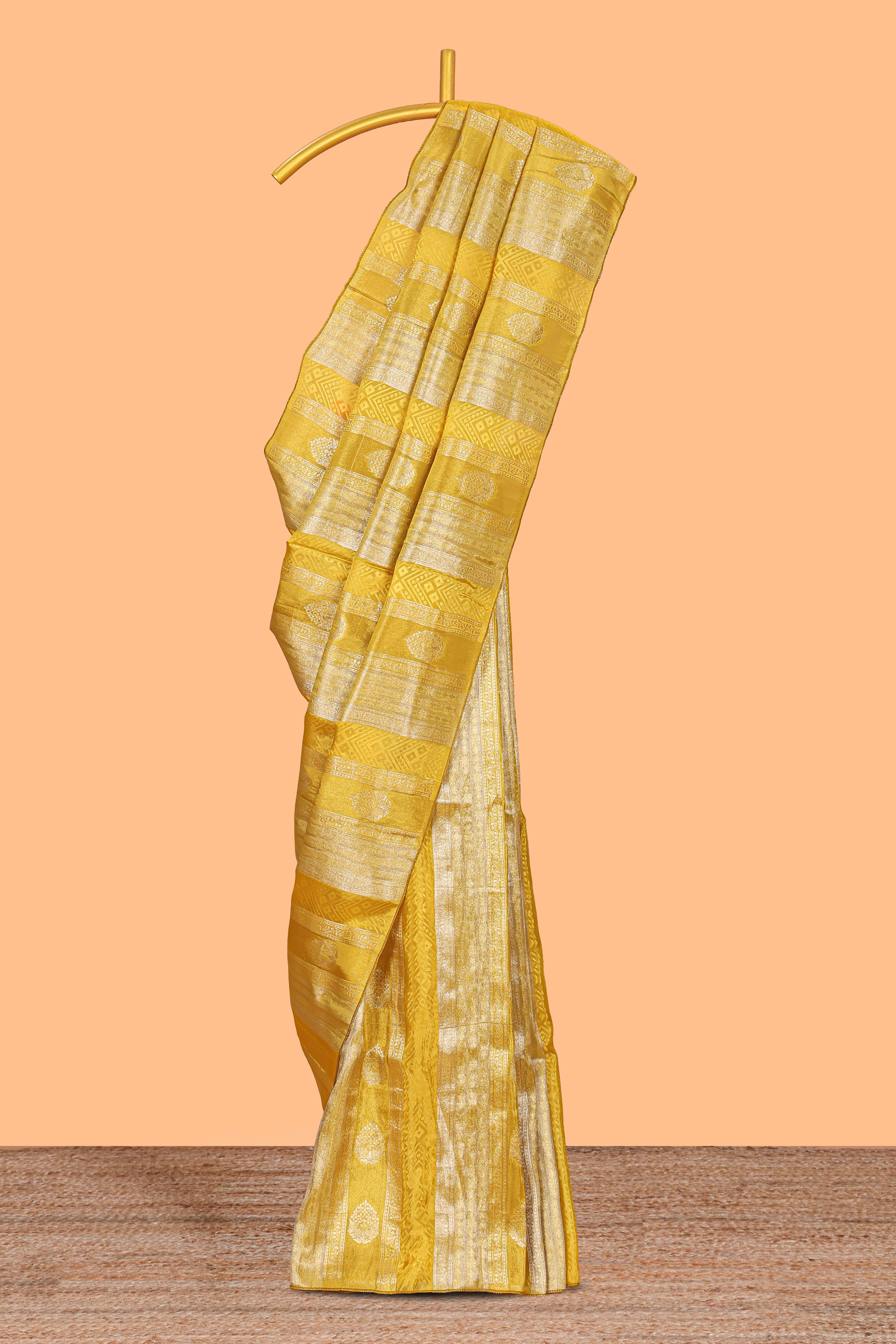 Borderless yellow striped floral design banarasi silk saree with self pallu and matching blouse