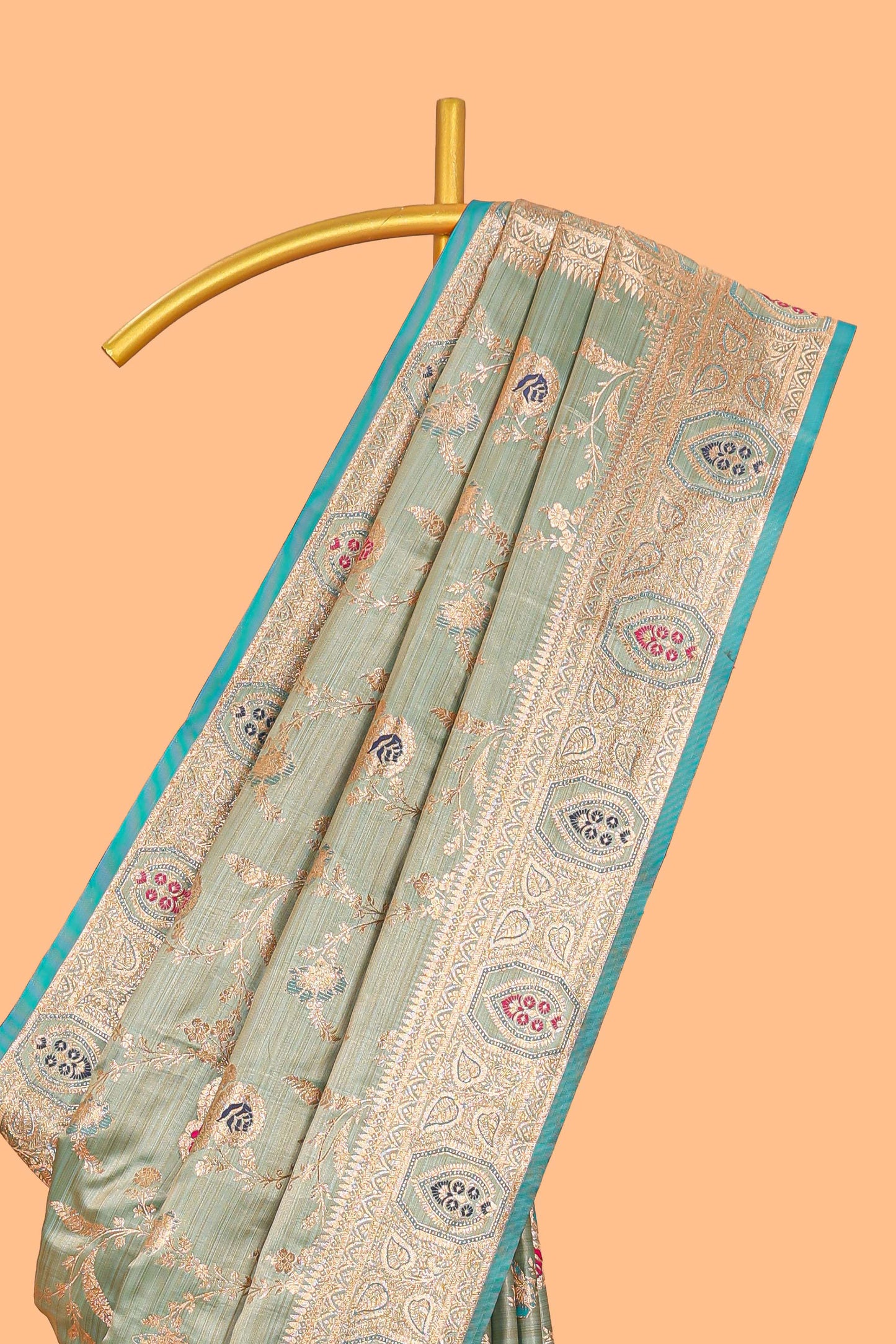 Green floral design banarasi silk saree with contrast border and floral printed blouse
