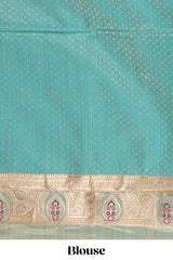 Green floral design banarasi silk saree with contrast border and floral printed blouse