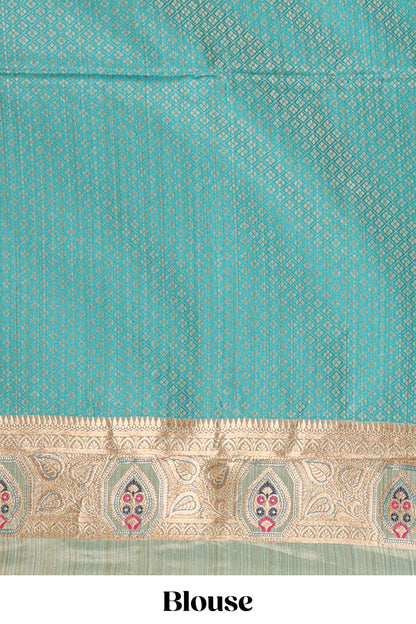 Green floral design banarasi silk saree with contrast border and floral printed blouse