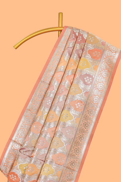 Pastel orange floral design motifs banarasi silk saree with self border and matching floral printed blouse