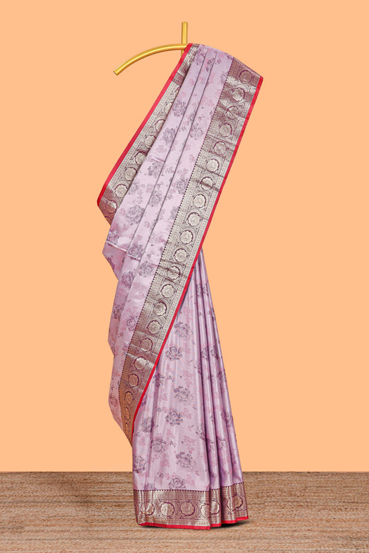 Lavender floral design banarasi silk saree with contrast border and matching floral printed blouse