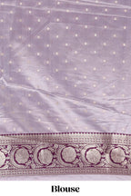 Lavender floral design banarasi silk saree with contrast border and matching floral printed blouse
